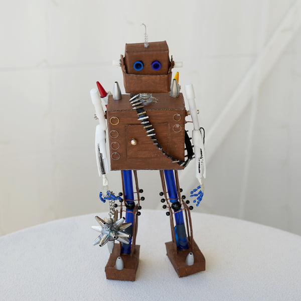 Handmade robot with old pen parts