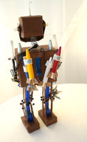 Handmade robot with old pen parts