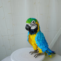 Handmade paper mache Blue and gold macaw parrot